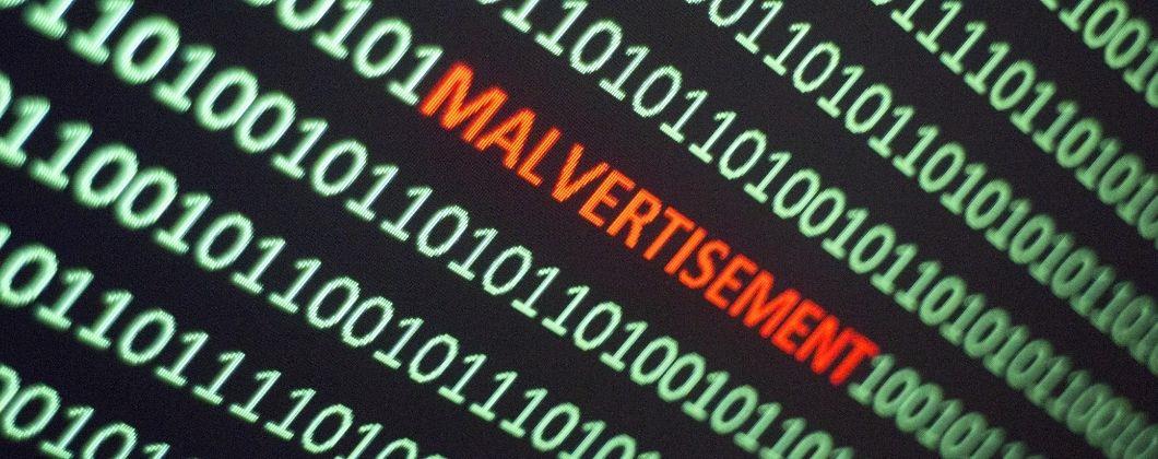 Binary code showing the word 'Malvertisment' in red